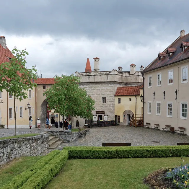 The first courtyard of Český Krumlov Castle with its sgraffito facades